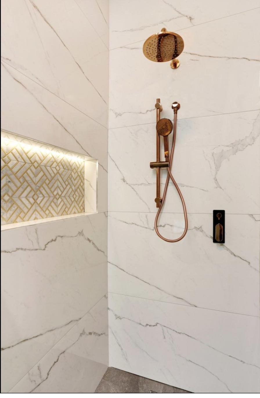 Shower Detail — Rose Gold Rain Head & Feature Niche