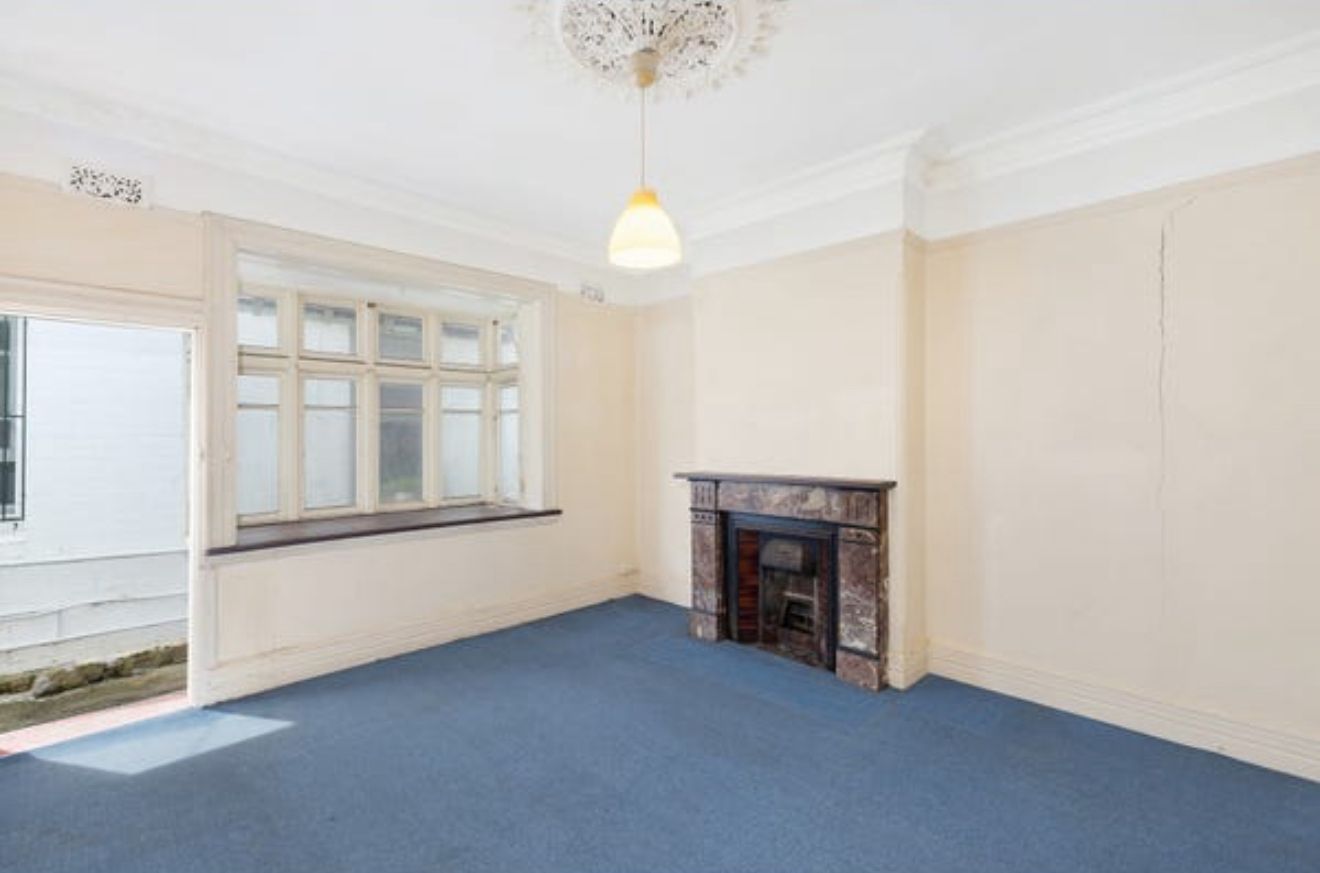 Original Living Room — Marble Fireplace