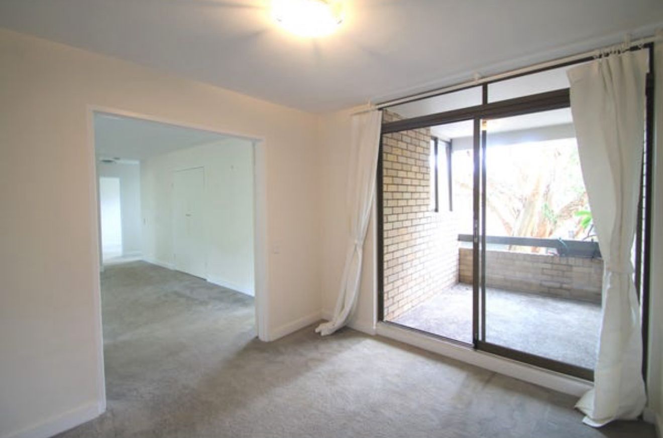 Pre-Renovation Bedroom — Dated Layout